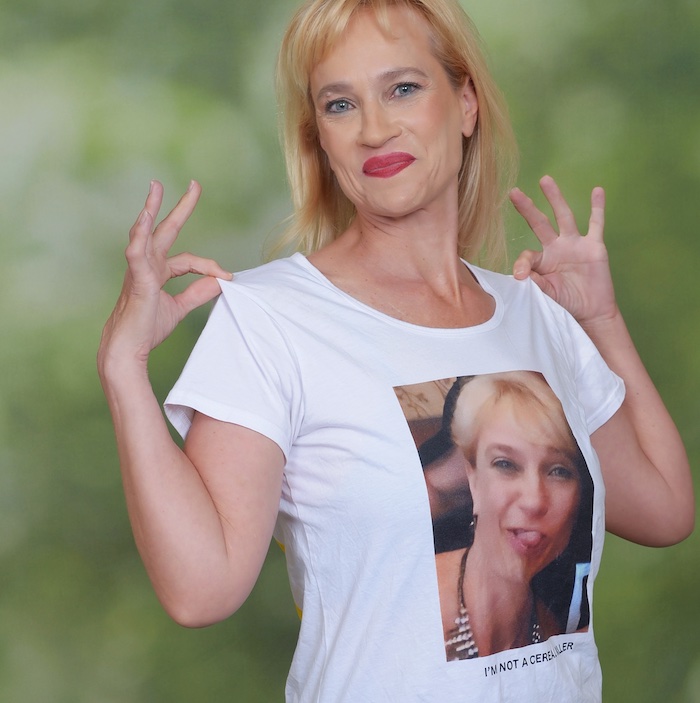 Model wearing merchandise t-shirt with cheeky face design